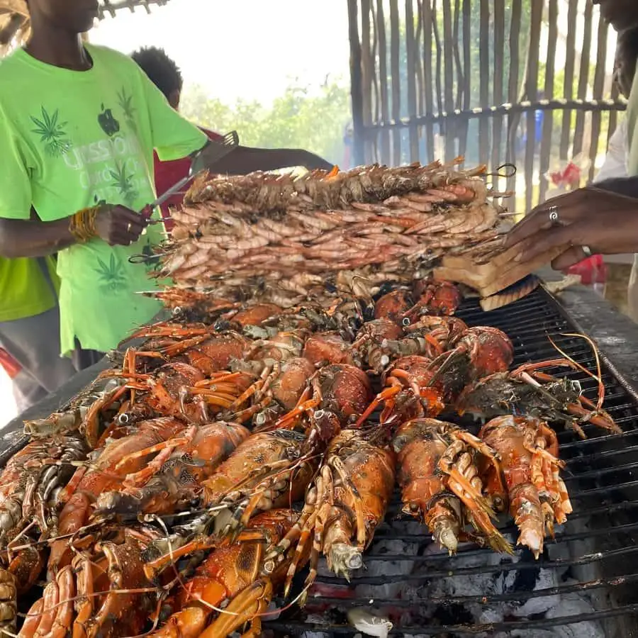 Grilled seafood lunch with fish prawns lobster and coconut rice at Sudi Island Watamu